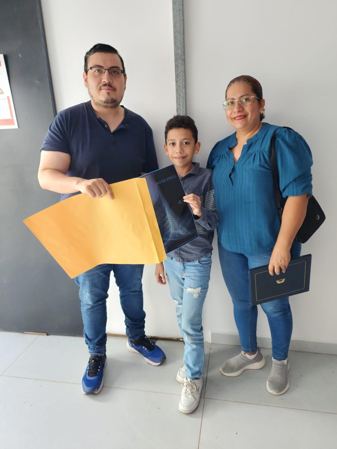 A family receives their son's X-ray results.
